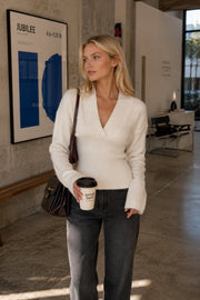 Ecru Knitted Sweater with V-Neck and Fitted Waist