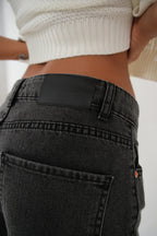 Asymmetric Kemer Slit Hem Black Jeans