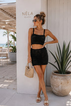 Black Two-Piece Set: Strappy Knitted Crop Blouse & Mini Skirt