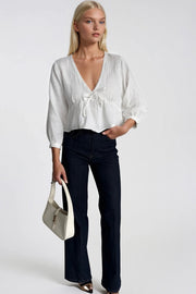 White Textured V-Neck Blouse with Lace-Up Detail