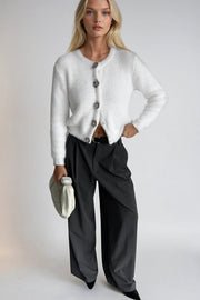 Ecru Knit Cardigan with Soft Texture and Floral Accessories